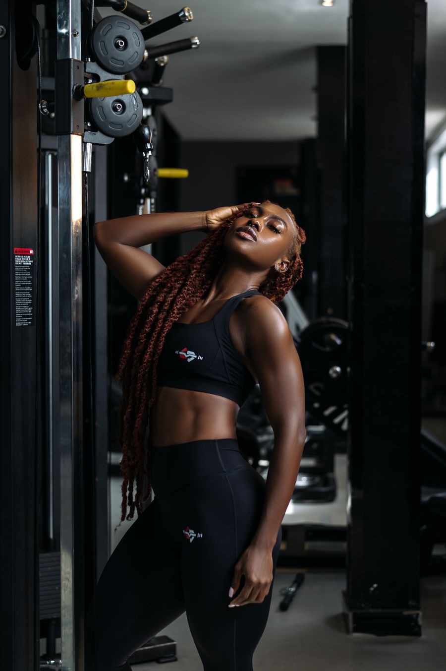 Fitness coach training in a modern gym
